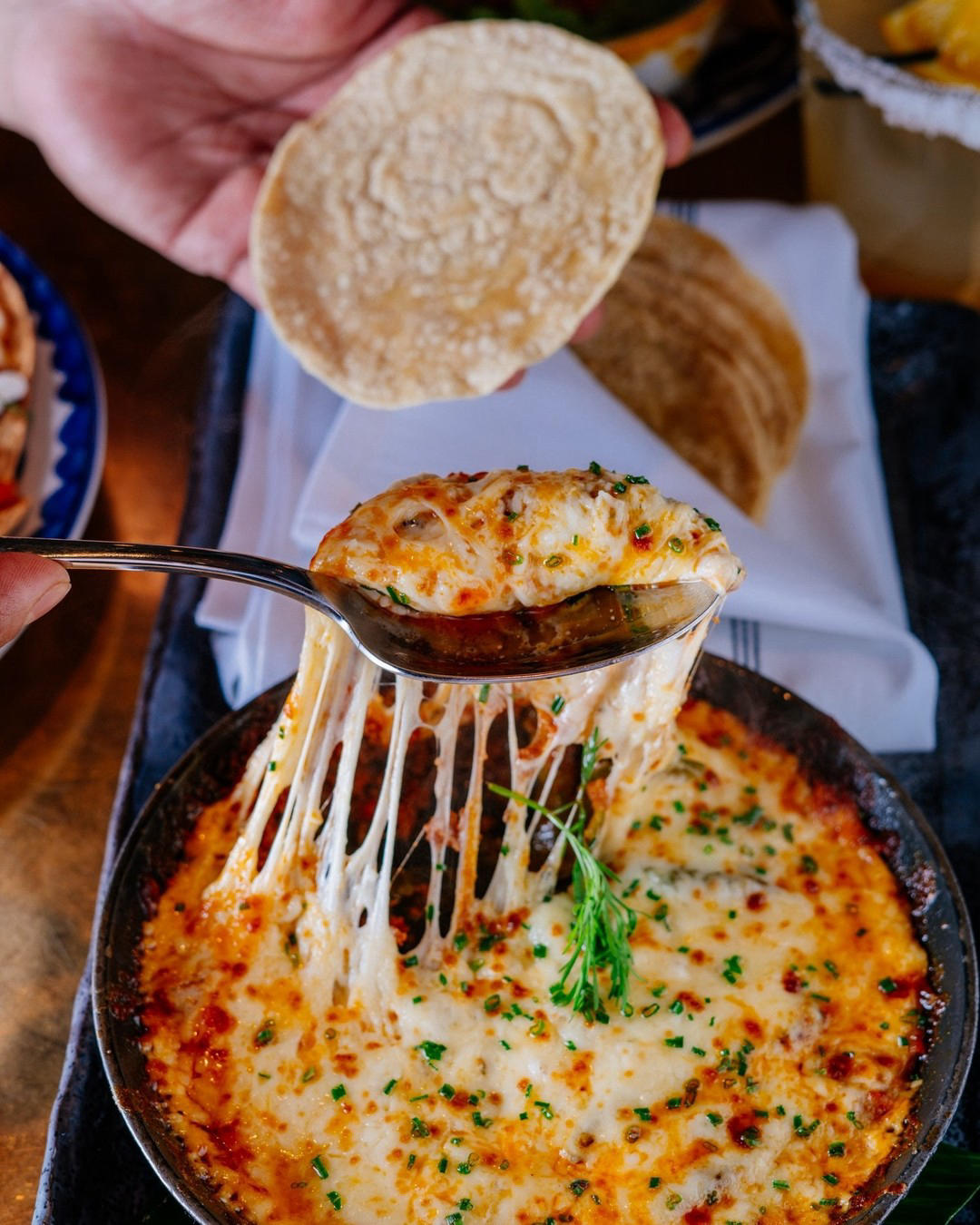 image  1 Bodega Negra Restaurant - Our Queso Fundido is the perfect appetizer to kick off your meal, made wit